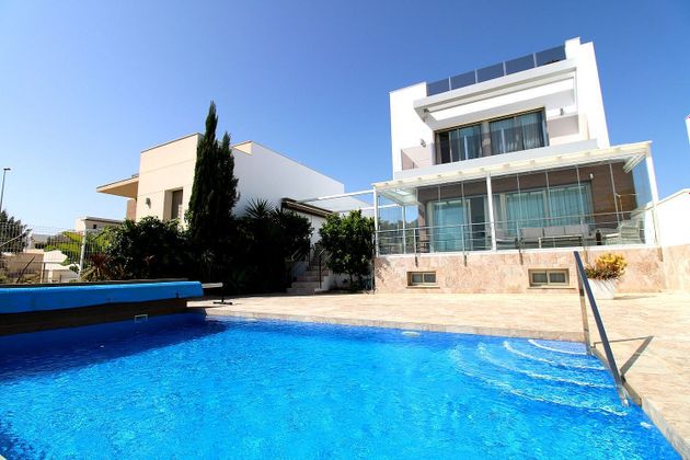 Foto 1 de Venta de chalet en San Miguel de Salinas de 5 habitaciones con terraza y piscina