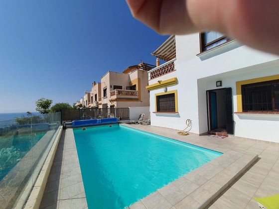 Foto 1 de Casa adosada en venta en Lagos de 3 habitaciones con terraza y piscina