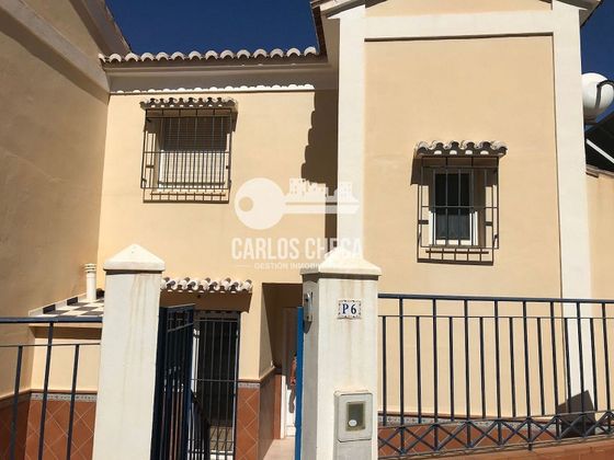 Foto 1 de Casa adosada en venta en Viña Málaga de 6 habitaciones con terraza y calefacción