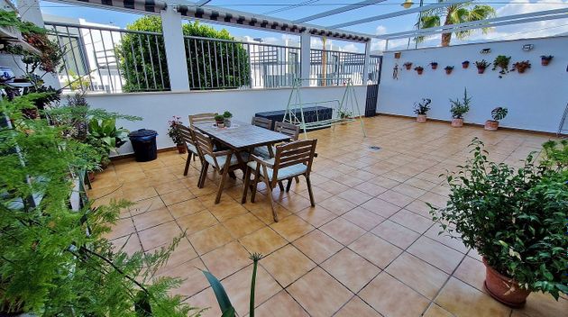Foto 1 de Venta de casa adosada en Caleta de Vélez de 3 habitaciones con terraza y piscina