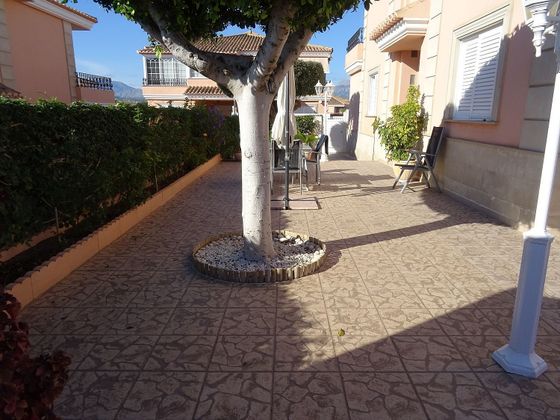 Foto 2 de Casa adossada en venda a Rincón de Loix de 4 habitacions amb terrassa i piscina