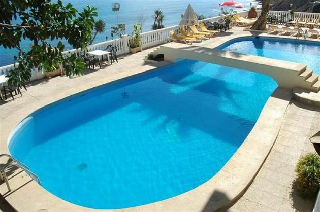 Foto 2 de Edificio en venta en Playa de los Locos con piscina y calefacción