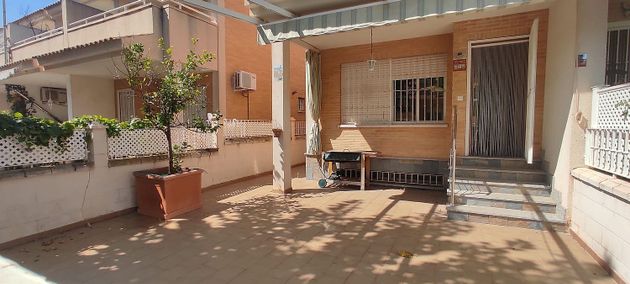 Foto 1 de Casa adosada en venta en Los Narejos de 6 habitaciones con terraza y aire acondicionado
