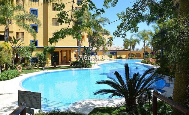 Foto 1 de Pis en venda a Nueva Alcántara de 2 habitacions amb piscina i jardí