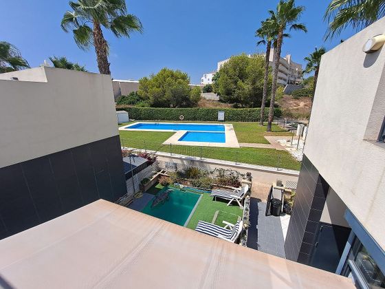 Foto 2 de Casa adossada en venda a calle Paso de Calais de 2 habitacions amb terrassa i piscina