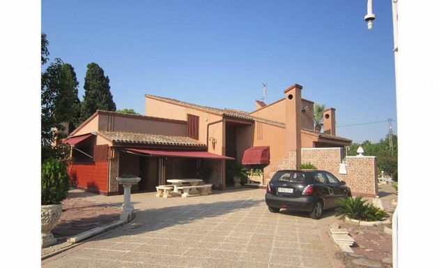 Foto 1 de Casa en venda a El Travaló - Martínez Valero de 4 habitacions amb terrassa i piscina