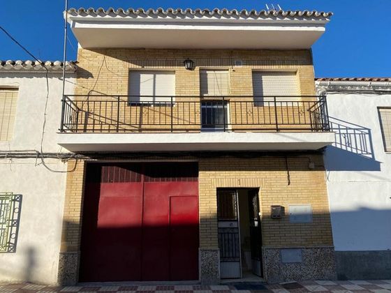 Foto 2 de Casa en venta en Cacín de 2 habitaciones con piscina y garaje