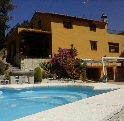Foto 2 de Casa en venda a Arenas del Rey de 4 habitacions amb piscina