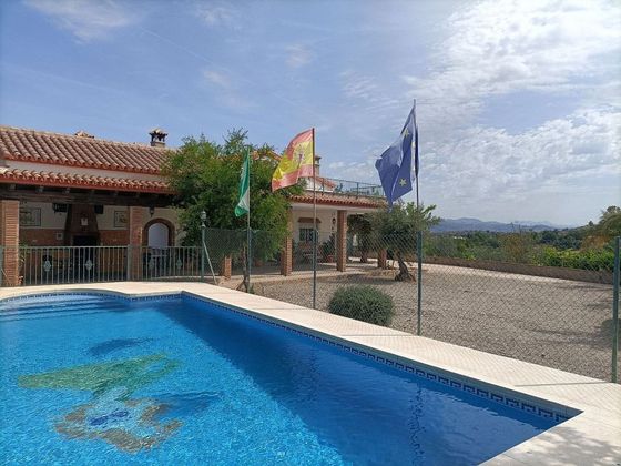 Foto 1 de Chalet en venta en calle Cortijo Benitez de 7 habitaciones con terraza y piscina