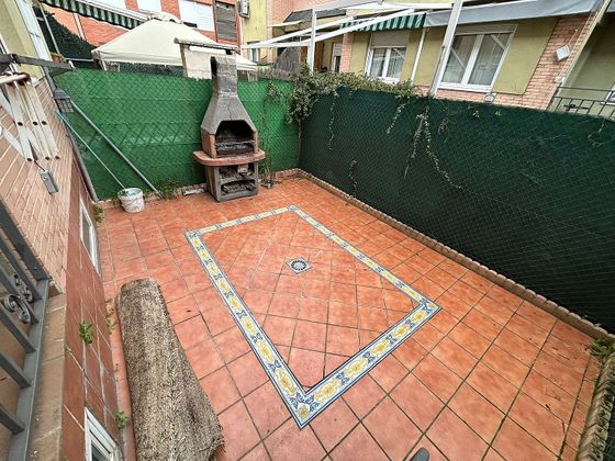 Foto 1 de Casa adosada en venta en Mejorada del Campo de 5 habitaciones con terraza y piscina