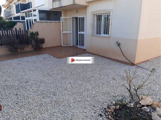 Foto 1 de Venta de casa en Orihuela Costa de 2 habitaciones con terraza y piscina