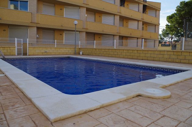 Foto 1 de Venta de piso en paseo Del Mediterrani de 2 habitaciones con terraza y piscina