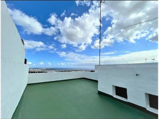 Foto 1 de Casa adosada en venta en Carrizal de 4 habitaciones con terraza y garaje