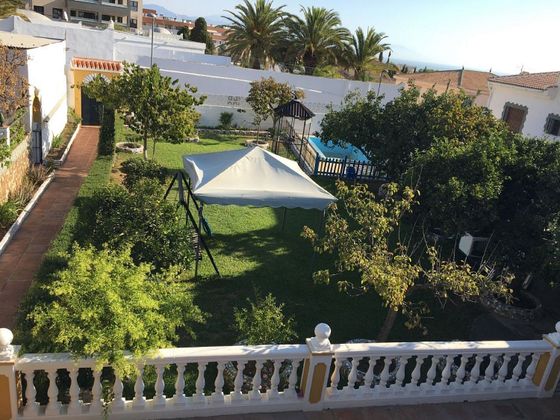 Foto 1 de Chalet en venta en El Pinillo de 3 habitaciones con terraza y piscina
