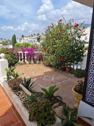 Foto 2 de Casa adossada en venda a Torrequebrada de 3 habitacions amb terrassa i jardí