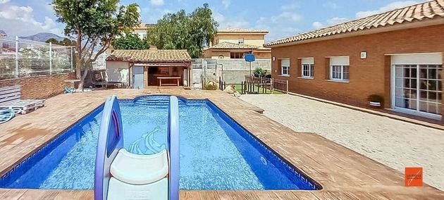 Foto 1 de Casa en venda a Roquetes de 4 habitacions amb piscina i garatge