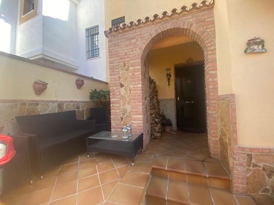 Foto 2 de Casa adossada en venda a Churriana de 3 habitacions amb terrassa i piscina