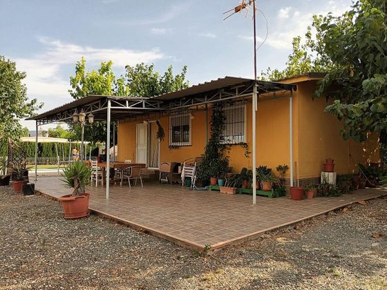 Foto 1 de Casa rural en venta en calle Del Rio de 3 habitaciones con terraza y piscina