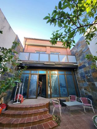Foto 1 de Casa adossada en venda a Lumpiaque de 3 habitacions amb terrassa i jardí