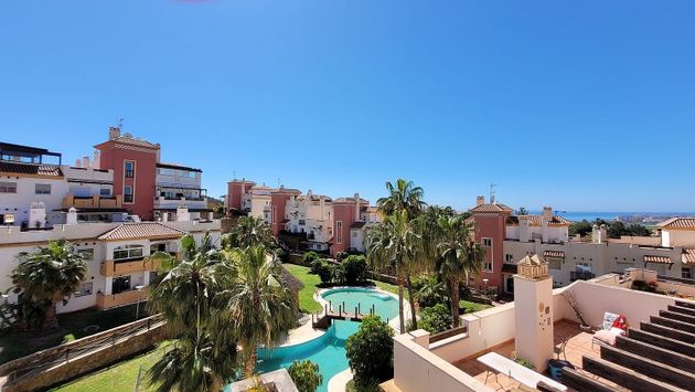 Foto 1 de Venta de piso en Caleta de Vélez de 3 habitaciones con terraza y piscina