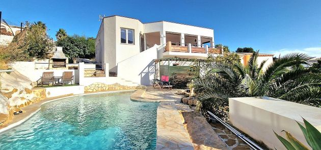 Foto 1 de Venta de casa en Benitachell/Poble Nou de Benitatxell (el) de 4 habitaciones con terraza y piscina
