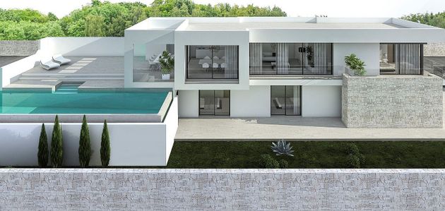 Foto 2 de Venta de casa en Pinar del Advocat - Cometa de 4 habitaciones con terraza y piscina