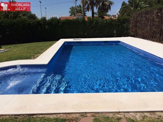 Foto 1 de Casa en venta en Rascanya de 4 habitaciones con terraza y piscina