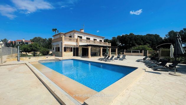 Foto 1 de Casa en venta en Cales de Mallorca de 8 habitaciones con terraza y piscina