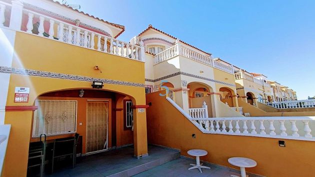 Foto 1 de Venta de casa en Dehesa de Campoamor - La Regia - Aguamarina de 2 habitaciones con terraza y piscina
