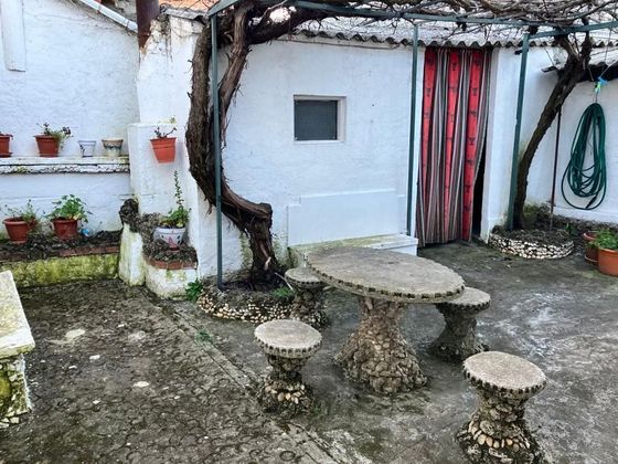 Foto 1 de Casa adosada en venta en calle Mariano Boal de 3 habitaciones con jardín y calefacción