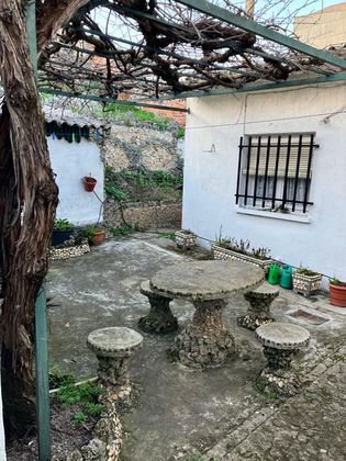 Foto 2 de Casa adosada en venta en calle Mariano Boal de 3 habitaciones con jardín y calefacción