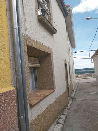 Foto 1 de Venta de casa adosada en calle Tahonas de 3 habitaciones con terraza y jardín