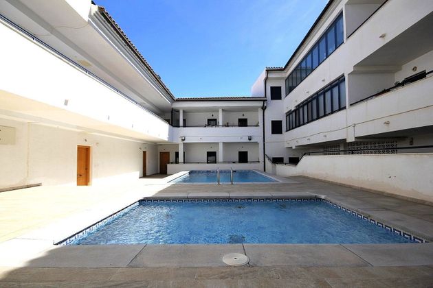 Foto 1 de Venta de piso en calle Alacant de 2 habitaciones con piscina y aire acondicionado