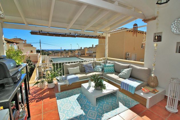Foto 1 de Casa adosada en venta en calle Ubeda de 3 habitaciones con terraza y piscina