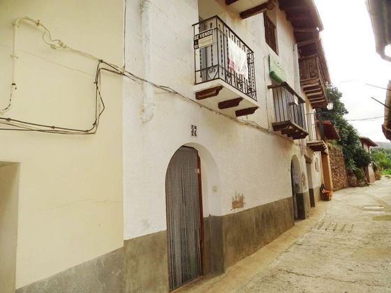 Foto 1 de Casa adosada en venta en Peñarroya de Tastavins de 4 habitaciones con balcón