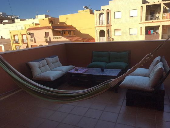 Foto 1 de Venta de casa en calle Villaricos de 5 habitaciones con terraza y aire acondicionado
