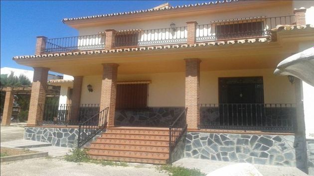 Foto 1 de Casa en venda a Villanueva del Trabuco de 5 habitacions amb terrassa i piscina