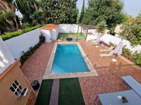Foto 1 de Venta de casa en Churriana de 5 habitaciones con terraza y piscina