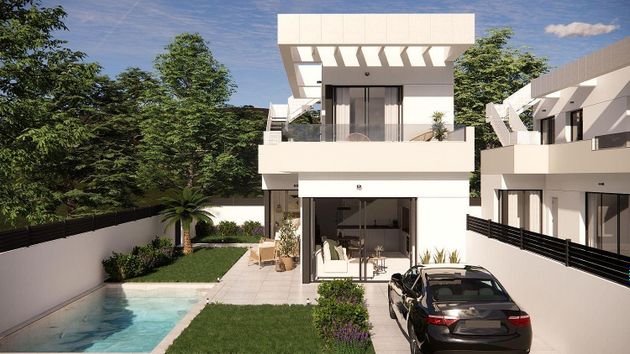 Foto 2 de Casa adosada en venta en Montesinos (Los) de 3 habitaciones con terraza y piscina