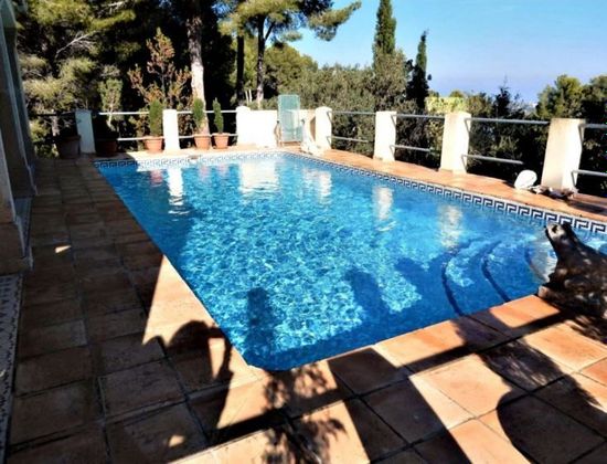 Foto 1 de Venta de casa en Pedreguer de 4 habitaciones con terraza y piscina