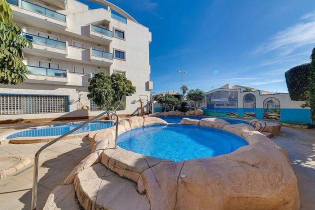 Foto 2 de Pis en venda a Dehesa de Campoamor - La Regia - Aguamarina de 2 habitacions amb piscina i aire acondicionat