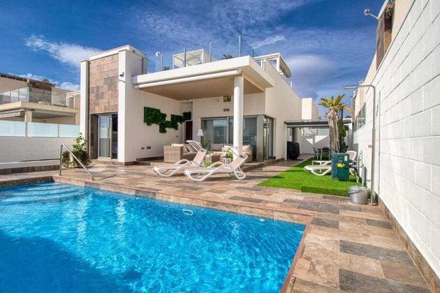 Foto 1 de Venta de casa en Campos de Golf - Villa Martin - Los Dolses de 3 habitaciones con terraza y piscina