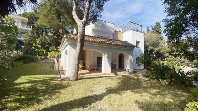 Foto 1 de Casa en venda a Dehesa de Campoamor - La Regia - Aguamarina de 5 habitacions amb terrassa i piscina