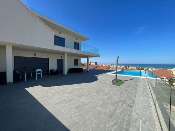 Foto 1 de Casa en venda a Torrelamata - La Mata de 5 habitacions amb piscina i garatge