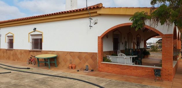 Foto 1 de Venta de casa rural en Cartaya de 4 habitaciones con terraza