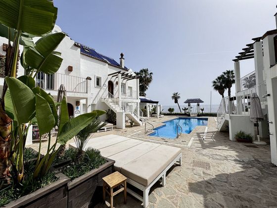 Foto 2 de Casa adosada en alquiler en Nueva Alcántara de 3 habitaciones con terraza y piscina