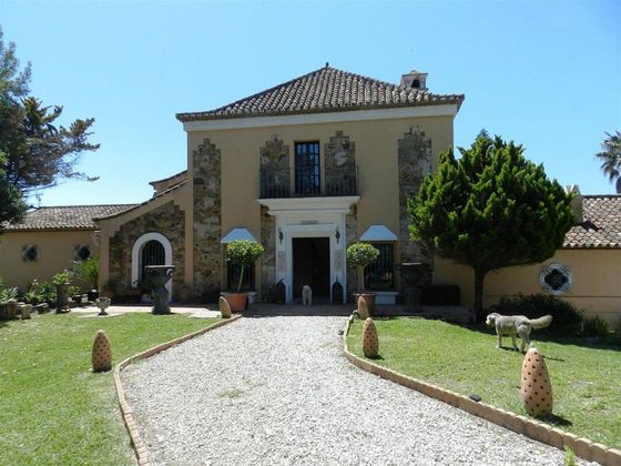 Foto 1 de Casa rural en venda a La Duquesa de 6 habitacions amb piscina i jardí