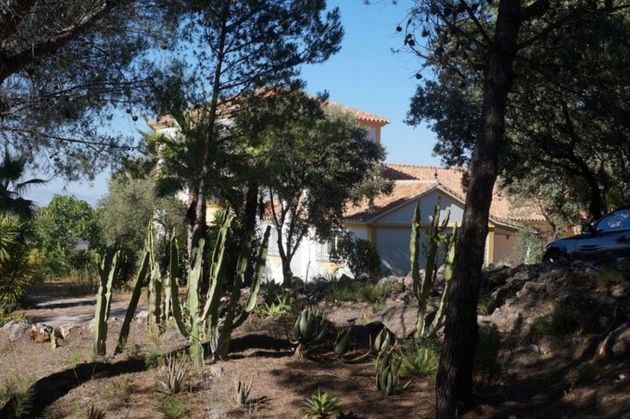 Foto 1 de Venta de casa rural en Monda de 7 habitaciones con terraza y jardín