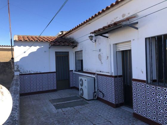 Foto 1 de Casa adossada en venda a calle Pozo de 4 habitacions amb terrassa i garatge