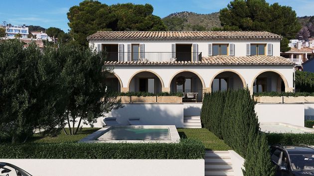 Foto 2 de Casa adosada en venta en Port d'Alcúdia - Platja d'Alcúdia de 4 habitaciones con terraza y piscina